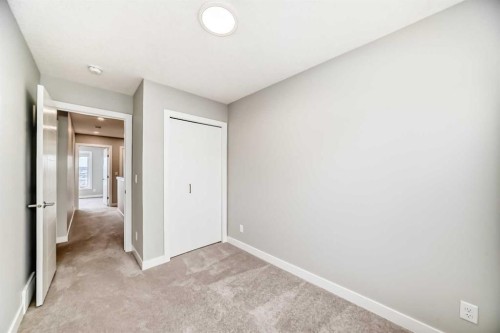 112 Evanscrest Square Nw, Calgary, AB - Indoor Photo Showing Other Room