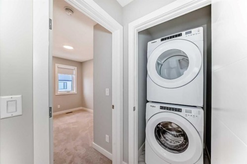 112 Evanscrest Square Nw, Calgary, AB - Indoor Photo Showing Laundry Room