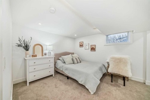 132 Wedgewood Drive Sw, Calgary, AB - Indoor Photo Showing Bedroom