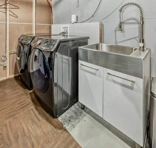 132 Wedgewood Drive Sw, Calgary, AB - Indoor Photo Showing Laundry Room