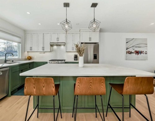 132 Wedgewood Drive Sw, Calgary, AB - Indoor Photo Showing Kitchen With Stainless Steel Kitchen With Upgraded Kitchen