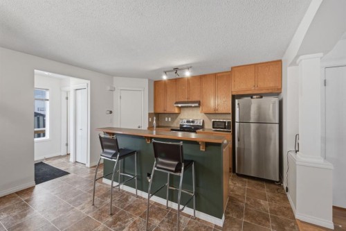59 Prestwick Bay Se, Calgary, AB - Indoor Photo Showing Kitchen