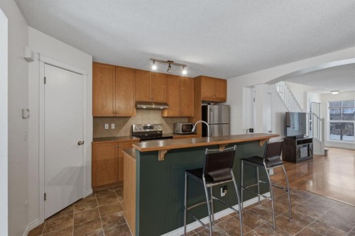 59 Prestwick Bay Se, Calgary, AB - Indoor Photo Showing Kitchen