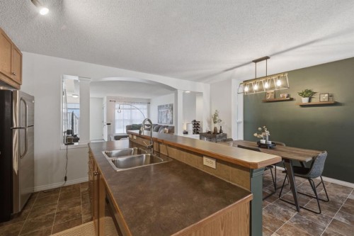 59 Prestwick Bay Se, Calgary, AB - Indoor Photo Showing Kitchen With Double Sink