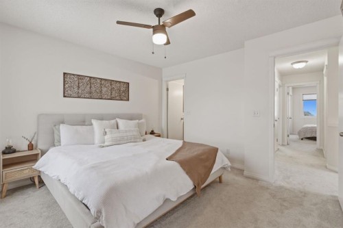 59 Prestwick Bay Se, Calgary, AB - Indoor Photo Showing Bedroom