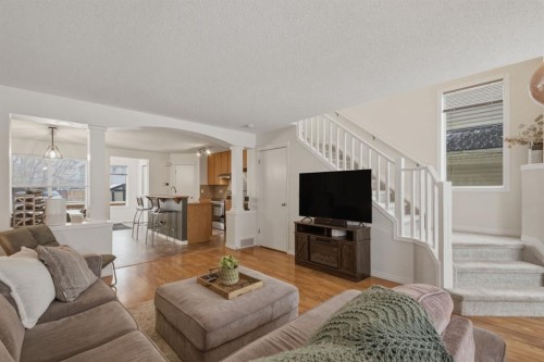 59 Prestwick Bay Se, Calgary, AB - Indoor Photo Showing Living Room