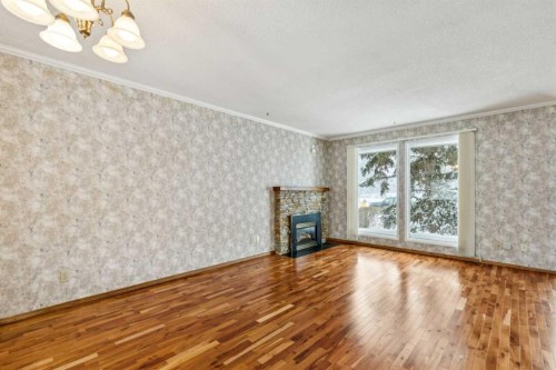 3412 Temple Road Ne, Calgary, AB - Indoor Photo Showing Other Room With Fireplace