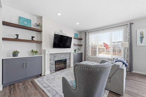 224 Auburn Glen Close Se, Calgary, AB - Indoor Photo Showing Living Room With Fireplace