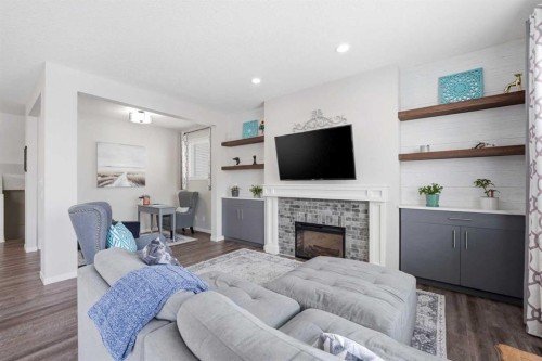 224 Auburn Glen Close Se, Calgary, AB - Indoor Photo Showing Living Room With Fireplace