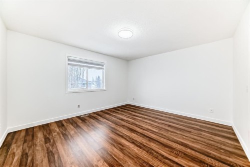87 Bridlepost Green Sw, Calgary, AB - Indoor Photo Showing Other Room