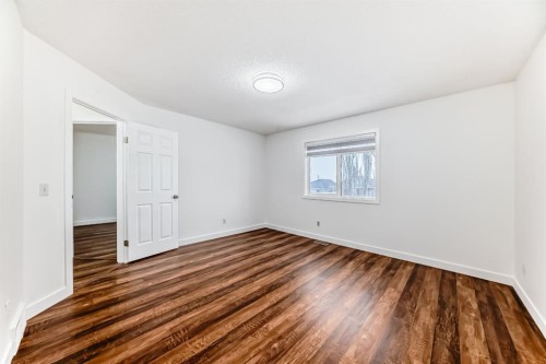 87 Bridlepost Green Sw, Calgary, AB - Indoor Photo Showing Other Room