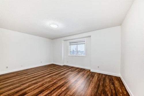 87 Bridlepost Green Sw, Calgary, AB - Indoor Photo Showing Other Room
