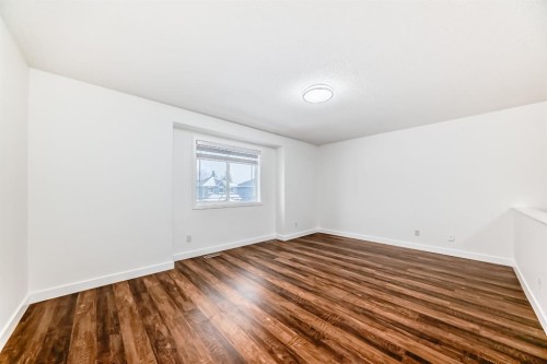 87 Bridlepost Green Sw, Calgary, AB - Indoor Photo Showing Other Room