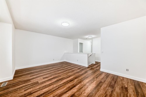 87 Bridlepost Green Sw, Calgary, AB - Indoor Photo Showing Other Room
