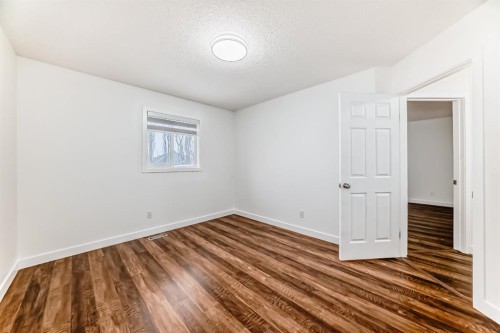 87 Bridlepost Green Sw, Calgary, AB - Indoor Photo Showing Other Room