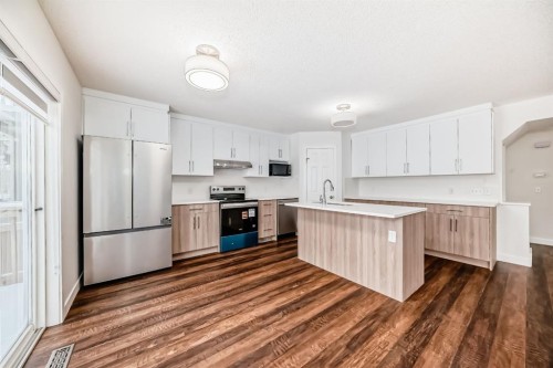 87 Bridlepost Green Sw, Calgary, AB - Indoor Photo Showing Kitchen