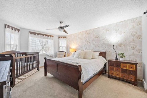 390 Cove Road, Chestermere, AB - Indoor Photo Showing Bedroom