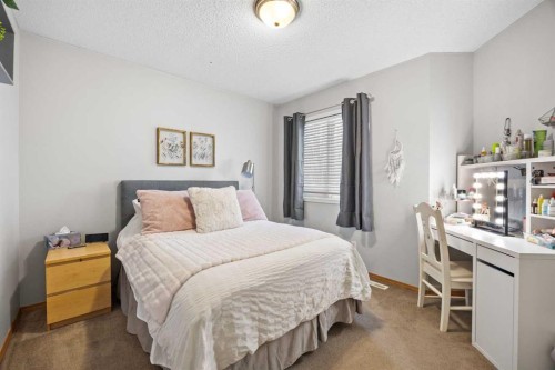 390 Cove Road, Chestermere, AB - Indoor Photo Showing Bedroom