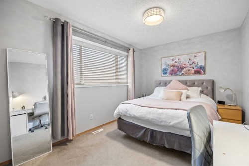 390 Cove Road, Chestermere, AB - Indoor Photo Showing Bedroom