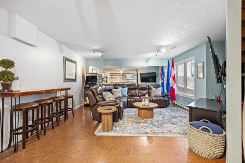 390 Cove Road, Chestermere, AB - Indoor Photo Showing Living Room