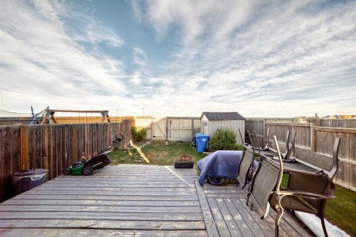 79 Saddlebrook Common Ne, Calgary, AB - Outdoor With Deck Patio Veranda