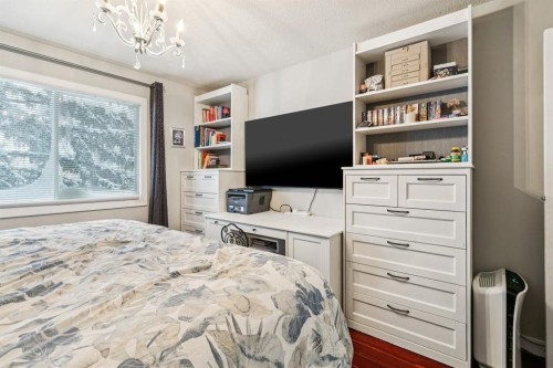 107 Sunbank Way Se, Calgary, AB - Indoor Photo Showing Bedroom