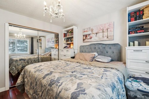 107 Sunbank Way Se, Calgary, AB - Indoor Photo Showing Bedroom