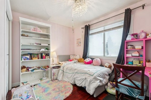 107 Sunbank Way Se, Calgary, AB - Indoor Photo Showing Bedroom