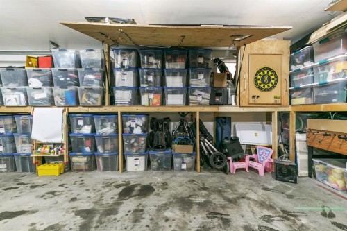 107 Sunbank Way Se, Calgary, AB - Indoor Photo Showing Garage