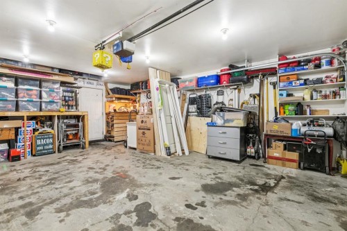 107 Sunbank Way Se, Calgary, AB - Indoor Photo Showing Garage