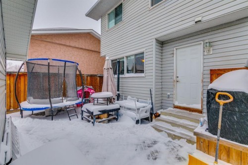107 Sunbank Way Se, Calgary, AB - Outdoor With Deck Patio Veranda With Exterior