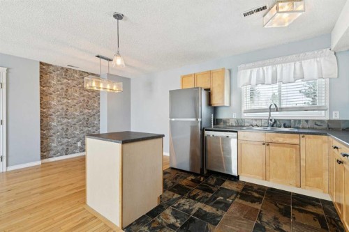 1104-1540 29 Street Nw, Calgary, AB - Indoor Photo Showing Kitchen