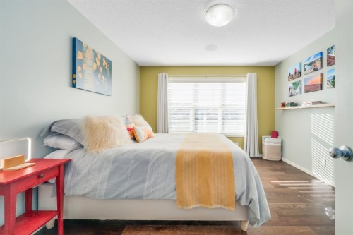 12 Sunrise View, Cochrane, AB - Indoor Photo Showing Bedroom