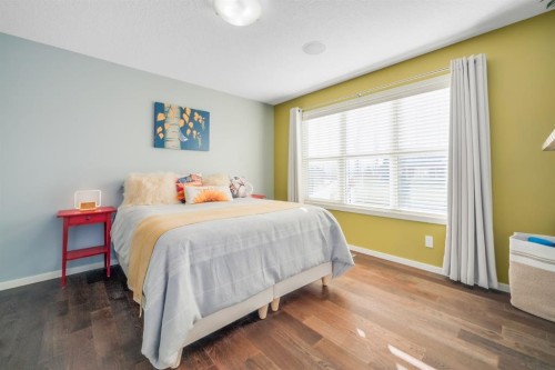 12 Sunrise View, Cochrane, AB - Indoor Photo Showing Bedroom
