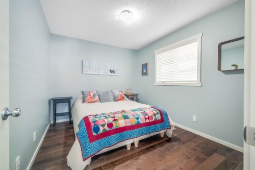 12 Sunrise View, Cochrane, AB - Indoor Photo Showing Bedroom
