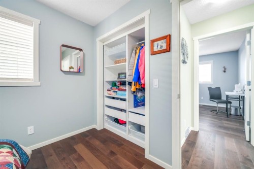 12 Sunrise View, Cochrane, AB - Indoor Photo Showing Other Room