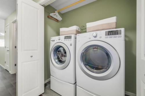 12 Sunrise View, Cochrane, AB - Indoor Photo Showing Laundry Room