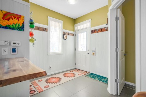 12 Sunrise View, Cochrane, AB - Indoor Photo Showing Other Room