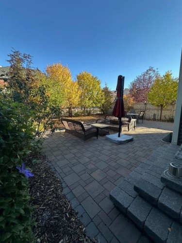 12 Sunrise View, Cochrane, AB - Outdoor With Deck Patio Veranda