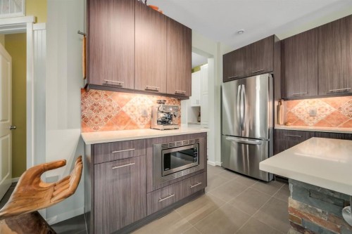 12 Sunrise View, Cochrane, AB - Indoor Photo Showing Kitchen