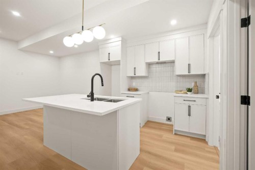 2421 25 Avenue Nw, Calgary, AB - Indoor Photo Showing Kitchen With Upgraded Kitchen