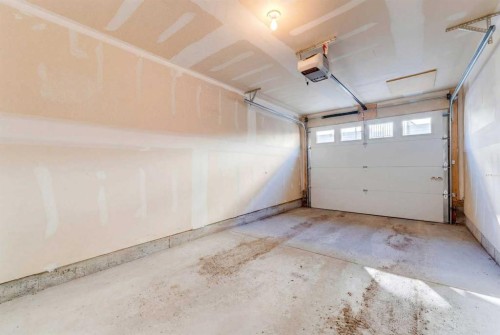 165 Evanscrest Gardens Nw, Calgary, AB - Indoor Photo Showing Garage