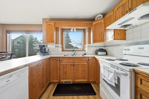 63 Coral Springs Green Ne, Calgary, AB - Indoor Photo Showing Kitchen With Double Sink