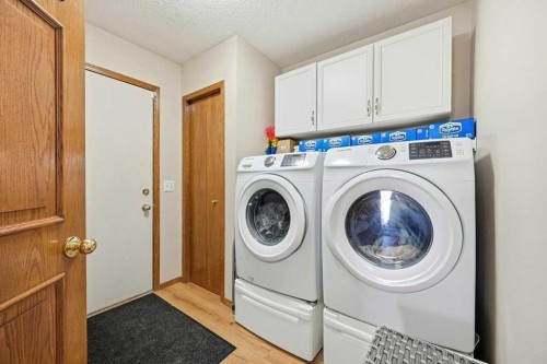 63 Coral Springs Green Ne, Calgary, AB - Indoor Photo Showing Laundry Room