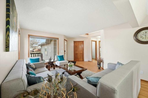 63 Coral Springs Green Ne, Calgary, AB - Indoor Photo Showing Living Room