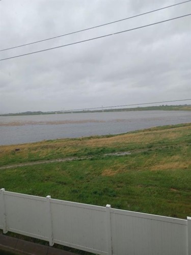 337 Copperpond Landing Se, Calgary, AB - Outdoor With Body Of Water