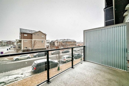 202-245 Redstone Walk Ne, Calgary, AB - Outdoor With Balcony With Exterior