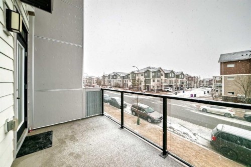 202-245 Redstone Walk Ne, Calgary, AB - Outdoor With Balcony With Exterior