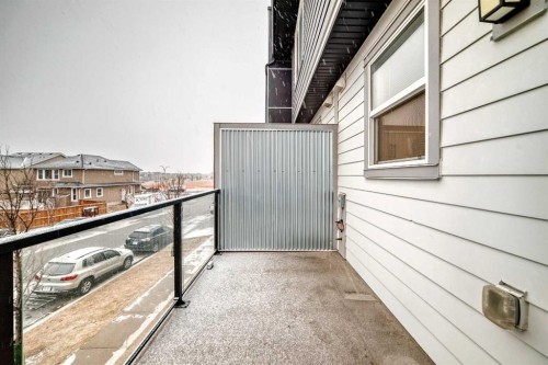 202-245 Redstone Walk Ne, Calgary, AB - Outdoor With Balcony With Exterior