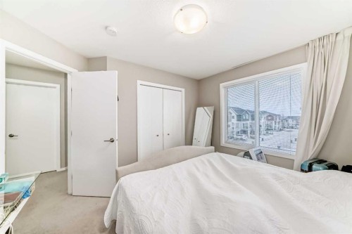 202-245 Redstone Walk Ne, Calgary, AB - Indoor Photo Showing Bedroom